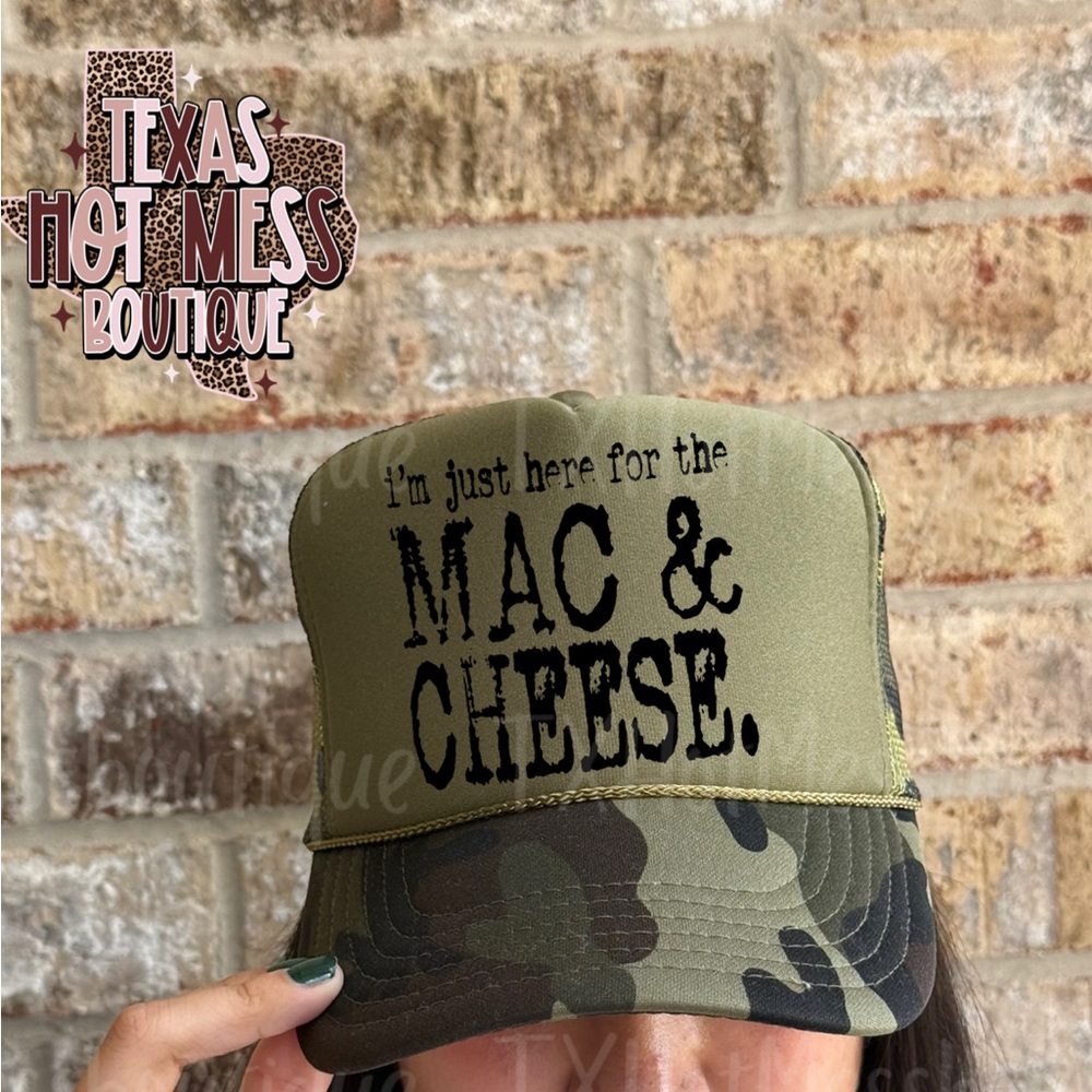 I’m just here for the Mac N Cheese  Camo trucker hat -